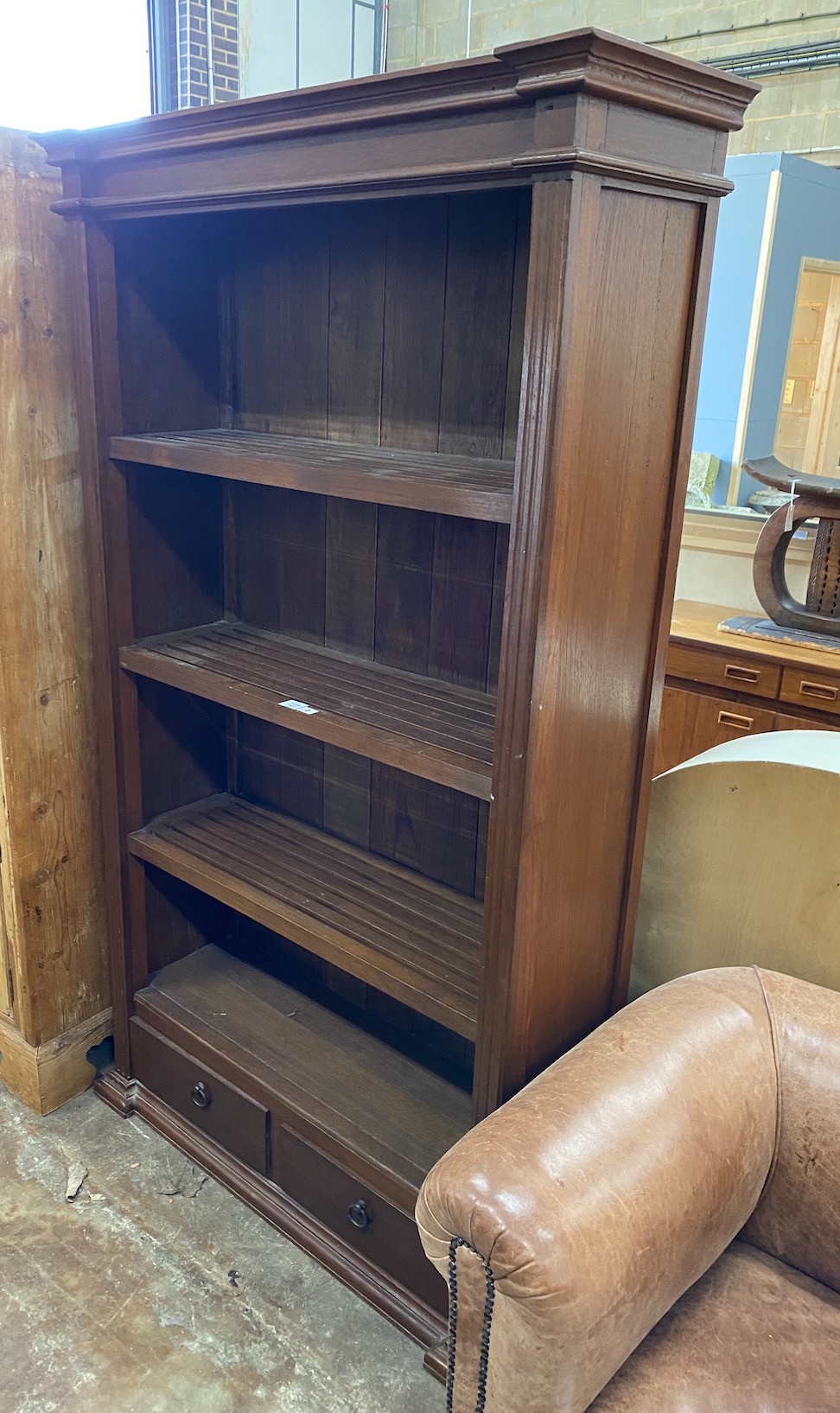A contemporary hardwood open bookcase, width 110cm, depth 39cm, height 192cm